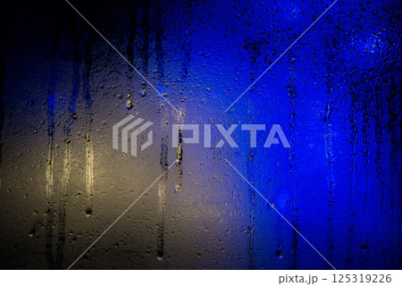 Background of misted glass. Christmas lights Background of misted glass. Christmas lights 125319226
