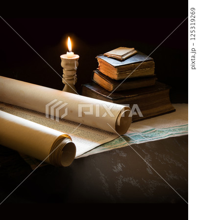 Still life from ancient books with candles 125319269