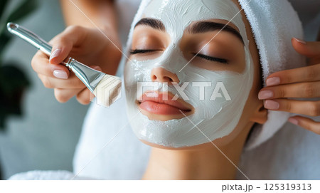Facial treatment beauty mask on lady face. 125319313