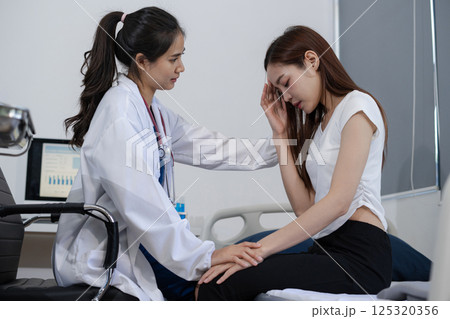 Stressed patient are treated by a psychologist or doctor in a psychiatric clinic. Patients reported symptoms of depression, stress, irritability, and life problems 125320356
