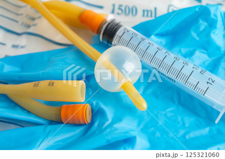 Foley catheter and urine drainage bag collect urine for disability or patient in hospital. 125321060