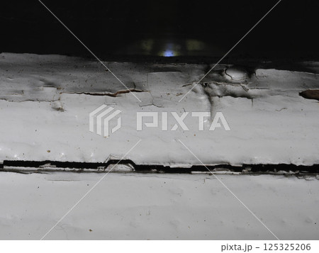 Cracked wood window detail close up 125325206