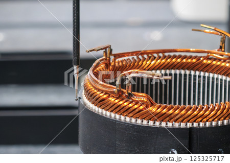 Close up scene the CMM machine working with the electric motor parts. 125325717