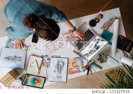 Designer working in studio Designer working in studio 125327038