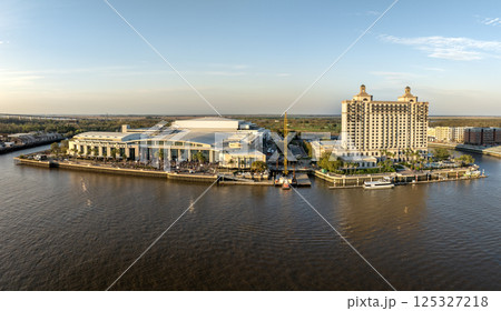 Savannah convention center in Savannah, Georgia. Waterfront American architecture. Southern USA cityscape at sunset Savannah convention center in Savannah, Georgia. Waterfront American architecture. Southern USA cityscape at sunset 125327218