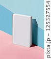 Standing blank hardcover book with white cover on monochrome background. Studio mockup photography. Book template for design. Design for poster, banner, card, postcard 125327554