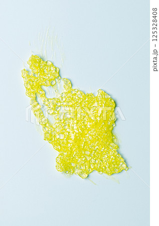 A sample of a cosmetic body care scrub. White background. 125328408