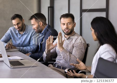 Colleagues discuss work-related matters, express vision and creative ideas Colleagues discuss work-related matters, express vision and creative ideas 125336377