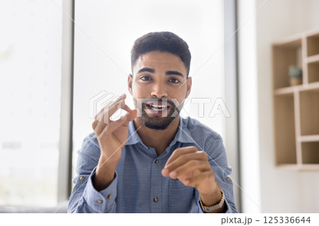 Screen view portrait young male speaking on web conference 125336644