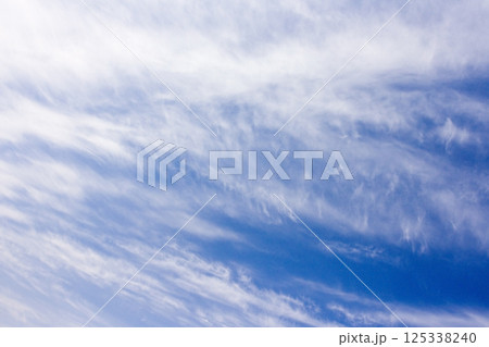 Beautiful blue sky and clouds background 125338240