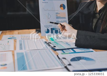 Business analyze,Close up Business people meeting to discuss the situation on the market. Business Financial Concept Business analyze,Close up Business people meeting to discuss the situation on the market. Business Financial Concept 125339031