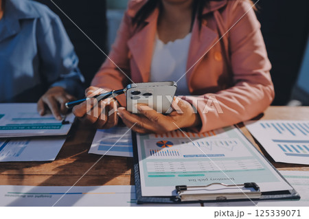 Business analyze,Close up Business people meeting to discuss the situation on the market. Business Financial Concept Business analyze,Close up Business people meeting to discuss the situation on the market. Business Financial Concept 125339071