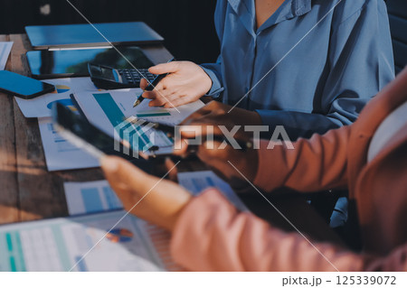 Business analyze,Close up Business people meeting to discuss the situation on the market. Business Financial Concept Business analyze,Close up Business people meeting to discuss the situation on the market. Business Financial Concept 125339072