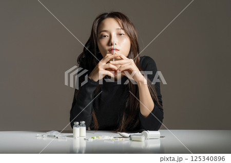 A young man in his 20s addicted to various drugs and drugs A young man in his 20s addicted to various drugs and drugs 125340896
