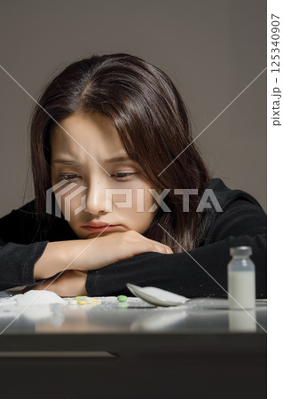 A young man in his 20s addicted to various drugs and drugs A young man in his 20s addicted to various drugs and drugs 125340907