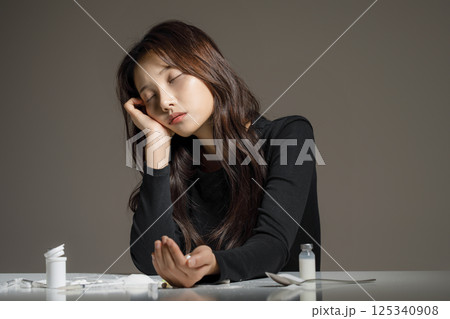 A young man in his 20s addicted to various drugs and drugs 125340908