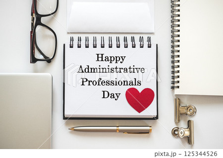 Happy Administrative Professionals Day. Notepad with congratulatory inscriptions Happy Administrative Professionals Day. Notepad with congratulatory inscriptions 125344526