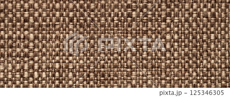 Texture brown color background from woven textile material with wicker pattern, macro. Structure vintage beige fabric Texture brown color background from woven textile material with wicker pattern, macro. Structure vintage beige fabric 125346305