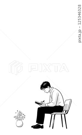 椅子に座ってノートに文字を書いている男性 125346328