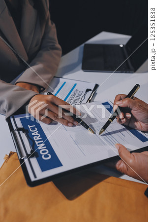Concept of legal counseling. The lawyer or legal counsel is listening and providing advice to business people. Concept of legal counseling. The lawyer or legal counsel is listening and providing advice to business people. 125351838