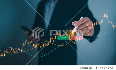 Businessman using pen touch candle chart financial growth of business and world economy, Stock market investment analysis, Financial risk management and investment, Stock market price increase. Businessman using pen touch candle chart financial growth of business and world economy, Stock market investment analysis, Financial risk management and investment, Stock market price increase. 125352378