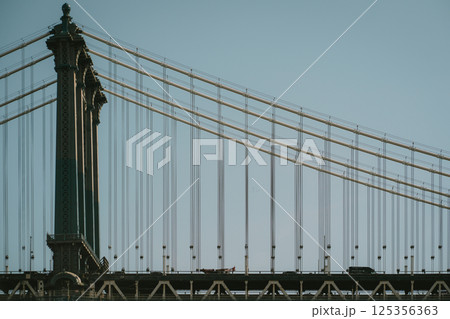 Closeup of a bridge with a beautiful blue sky background 125356363
