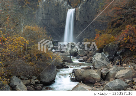 Naena waterfall in foggy autumn season Naena waterfall in foggy autumn season 125357136