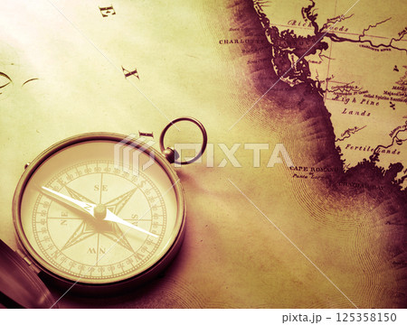 Compass with vintage map Compass with vintage map 125358150