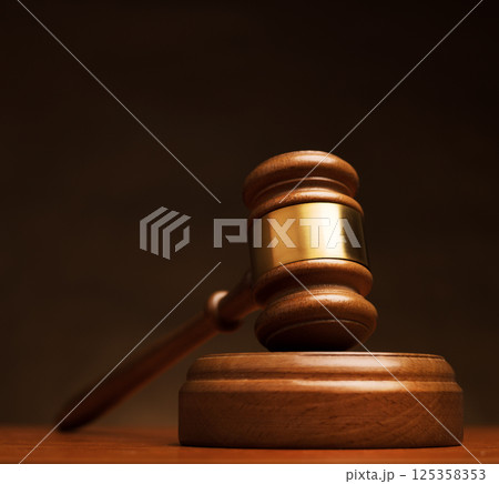 Wooden gavel on judge's table Wooden gavel on judge's table 125358353