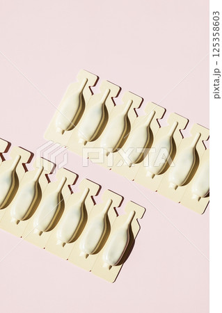 Two Rows of Pharmaceutical Ampoules in Blister Pack. Mockup for Drug Advertisement and Design Usage. Two Rows of Pharmaceutical Ampoules in Blister Pack. Mockup for Drug Advertisement and Design Usage. 125358603