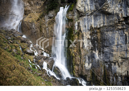 Seerenbach Falls cascading down by Lake Walensee in Switzerland Seerenbach Falls cascading down by Lake Walensee in Switzerland 125358623