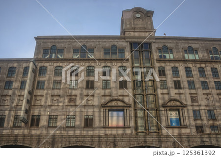 March 23 2025 Historic Building Facade With Clock Tower and Symmetrical Windows 125361392