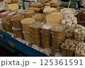 a counter with desserts - honey, cottage cheese and Kazakh delicacies made on the basis of wheat 125361591