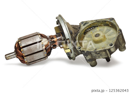 disassembled car windshield wipers permanent magnet DC motor. armature with collector in gear housing with plastic ring gear. isolated on white background, with clipping path 125362043