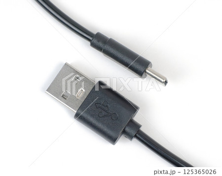 A USB cable with a power connector ready for device charging and data transfer 125365026