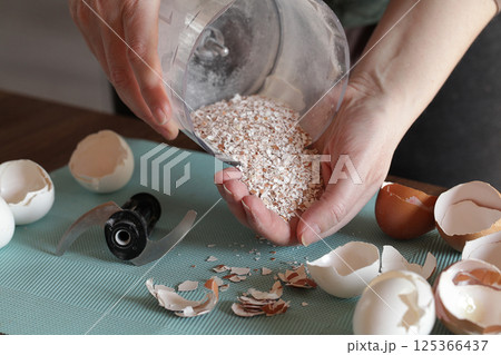 Preparing Eggshell Powder. Calcium supplement eggshell, natural compost Preparing Eggshell Powder. Calcium supplement eggshell, natural compost 125366437