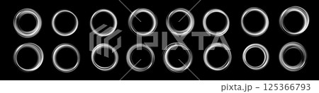 A collection of intricate circular patterns displayed against a dark background, showcasing artistic design 125366793