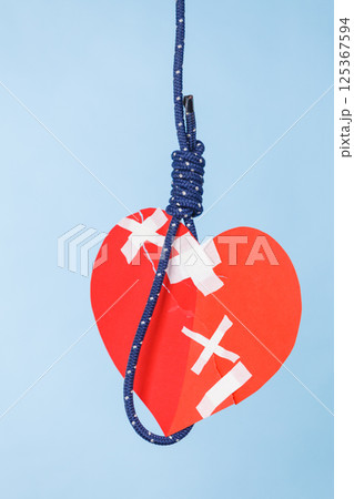 Heart on suicide rope 125367594