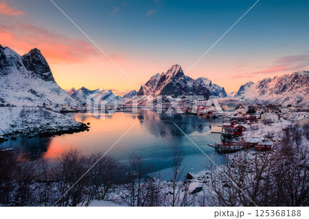 Viewpoint of Reine town with snow covered mountain in winter at Lofoten Islands Viewpoint of Reine town with snow covered mountain in winter at Lofoten Islands 125368188