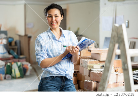 Apartment owner who checks the completed work on Apartment owner who checks the completed work on 125370219