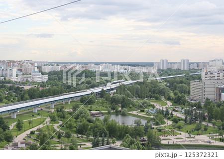 View of the Yuzhnoye Butovo landscape park and the surface metro in the Yuzhnoye Butovo district 125372321