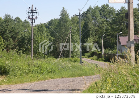 Rural views, village streets in the suburbs. Russia. Moscow region. Rural views, village streets in the suburbs. Russia. Moscow region. 125372379