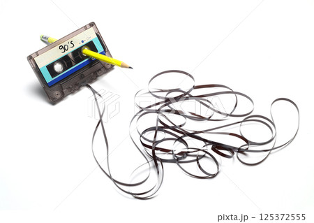 A pen for rewind cassette tape compact retro on white background. 90's concepts. 125372555