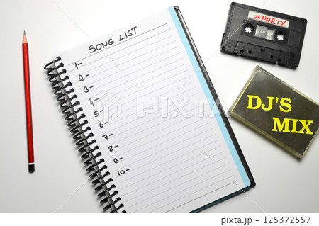 Retro audio cassette tape from the 80s and 90s on a white backgroun Retro audio cassette tape from the 80s and 90s on a white backgroun 125372557