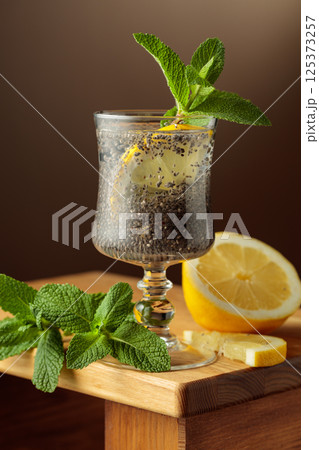 Diet vegan cocktail with chia seeds, lemon, and mint. Diet vegan cocktail with chia seeds, lemon, and mint. 125373257