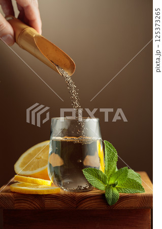 Diet and detox cocktail with chia seeds, lemon, and mint. 125373265