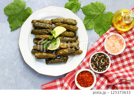 Stuffed collard greens with boiled leaves, traditonal turkish black sea region food, sarma, dolma 125373633