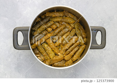 Stuffed collard greens with boiled leaves, traditonal turkish black sea region food, sarma, dolma Stuffed collard greens with boiled leaves, traditonal turkish black sea region food, sarma, dolma 125373900
