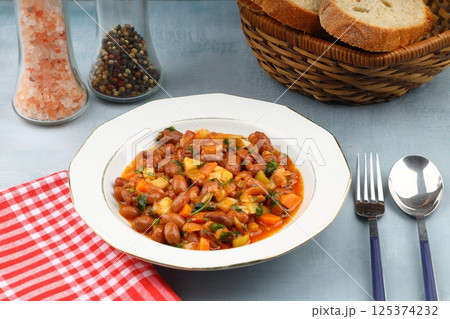 Traditional delicious Turkish food; Kidney beans with olive oil, Red kidney bean stew, Turkish name; Barbunya pilaki 125374232