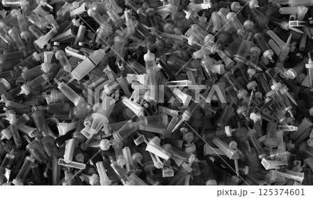 Safety Utilization Of Disposable Intravenous Drips And Transfusion Sets Black And White Image. Dangerous Medical Equipment Recycling Stock Photo 125374601